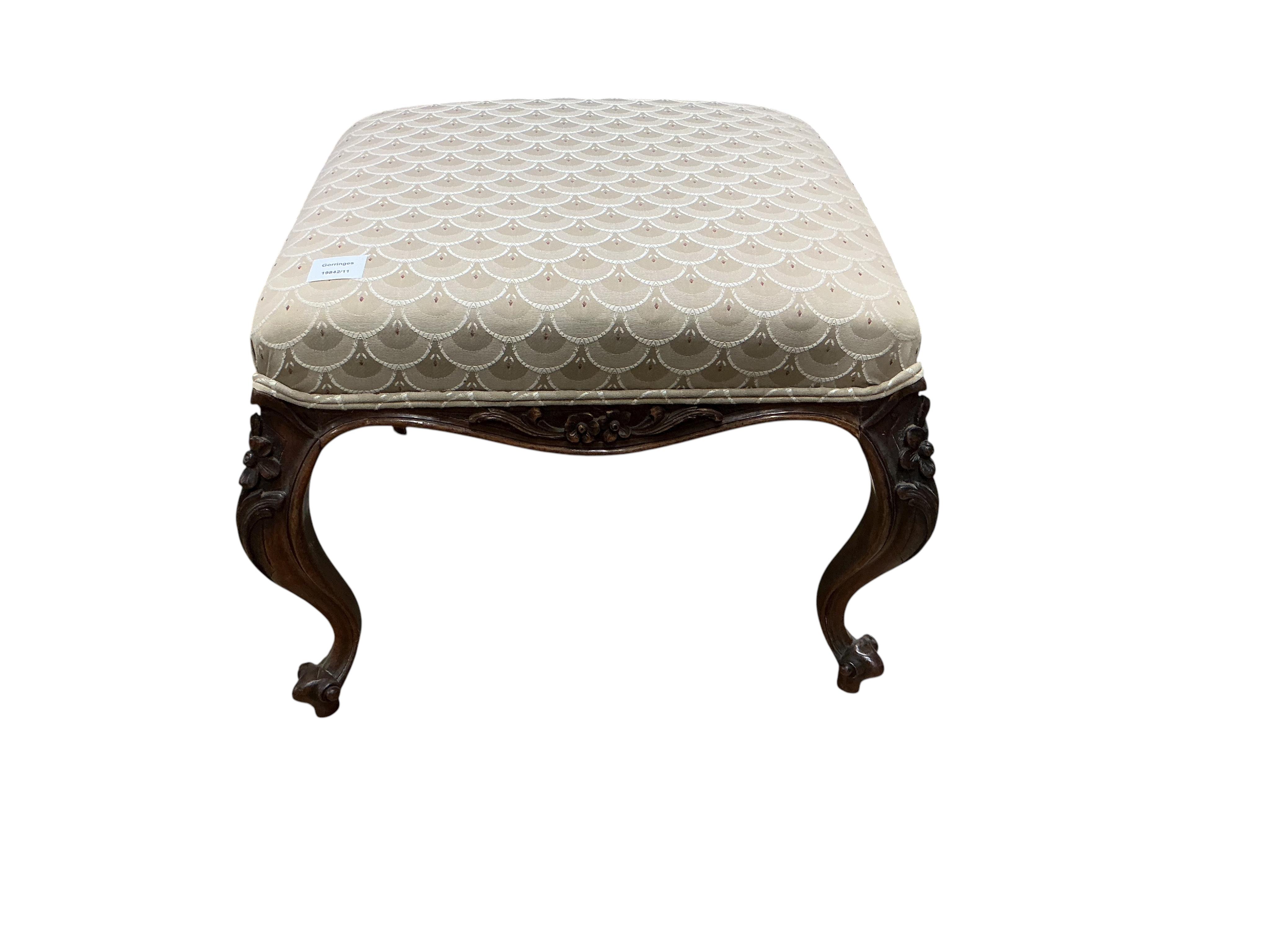 A Victorian carved rosewood dressing stool, width 53cm, depth 54cm, height 41cm